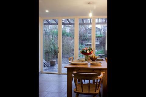 Extending the home has created a spacious kitchen/dining area and folding doors link the space to the garden